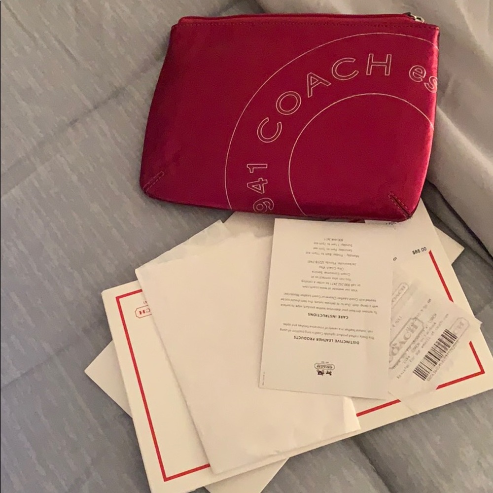 Coach Foil Chubby Silver clutch